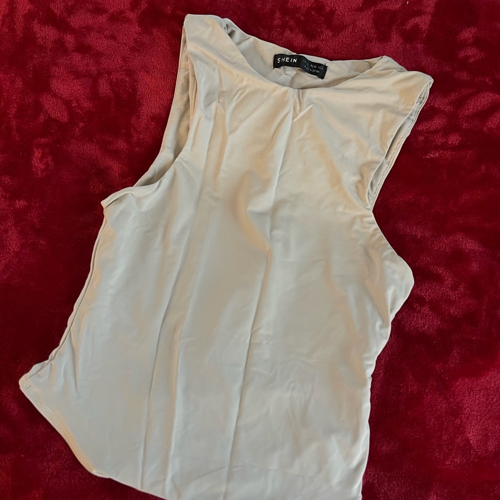 Beige / tan body suit